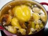 Fully simmered chicken stock with golden broth.
