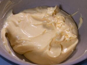 Creamy homemade mayonnaise in a mixing bowl.