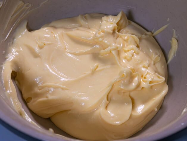 Creamy homemade mayonnaise in a mixing bowl.
