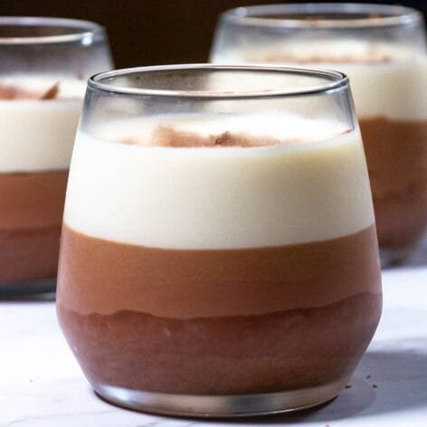 Triple Chocolate Mousse with dark, milk, and white chocolate layers in glass cups.